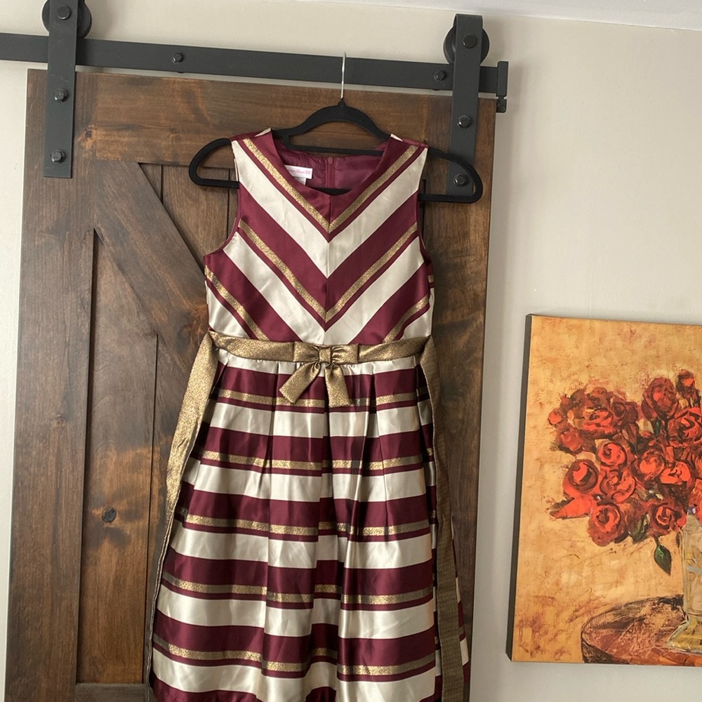NWT Bonnie Jean maroon and gold strip dress. Bow detail in front and sash